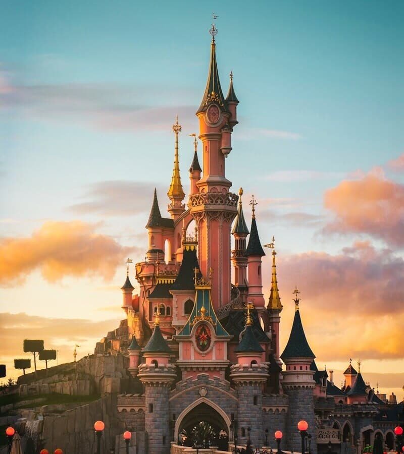 brown and blue castle under cloudy sky during daytime