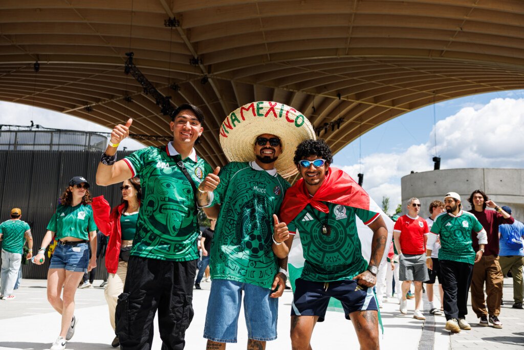Crowd clapping and cheering in stands at FIFA Fan Festival Vancouver