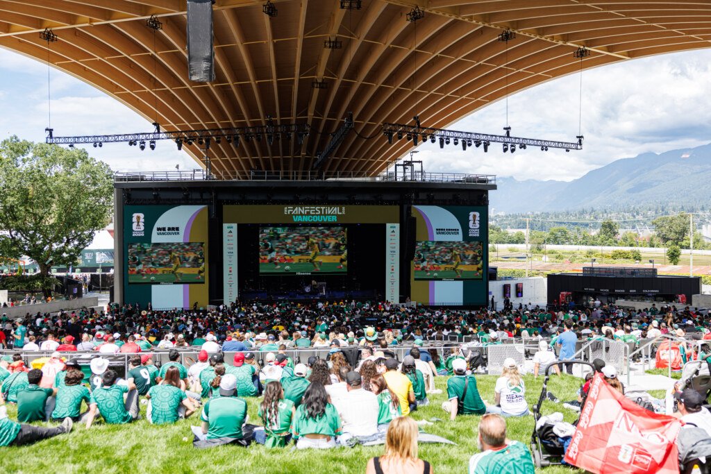 Group of Mexican fans posing together at FIFA Fan Festival Vancouver