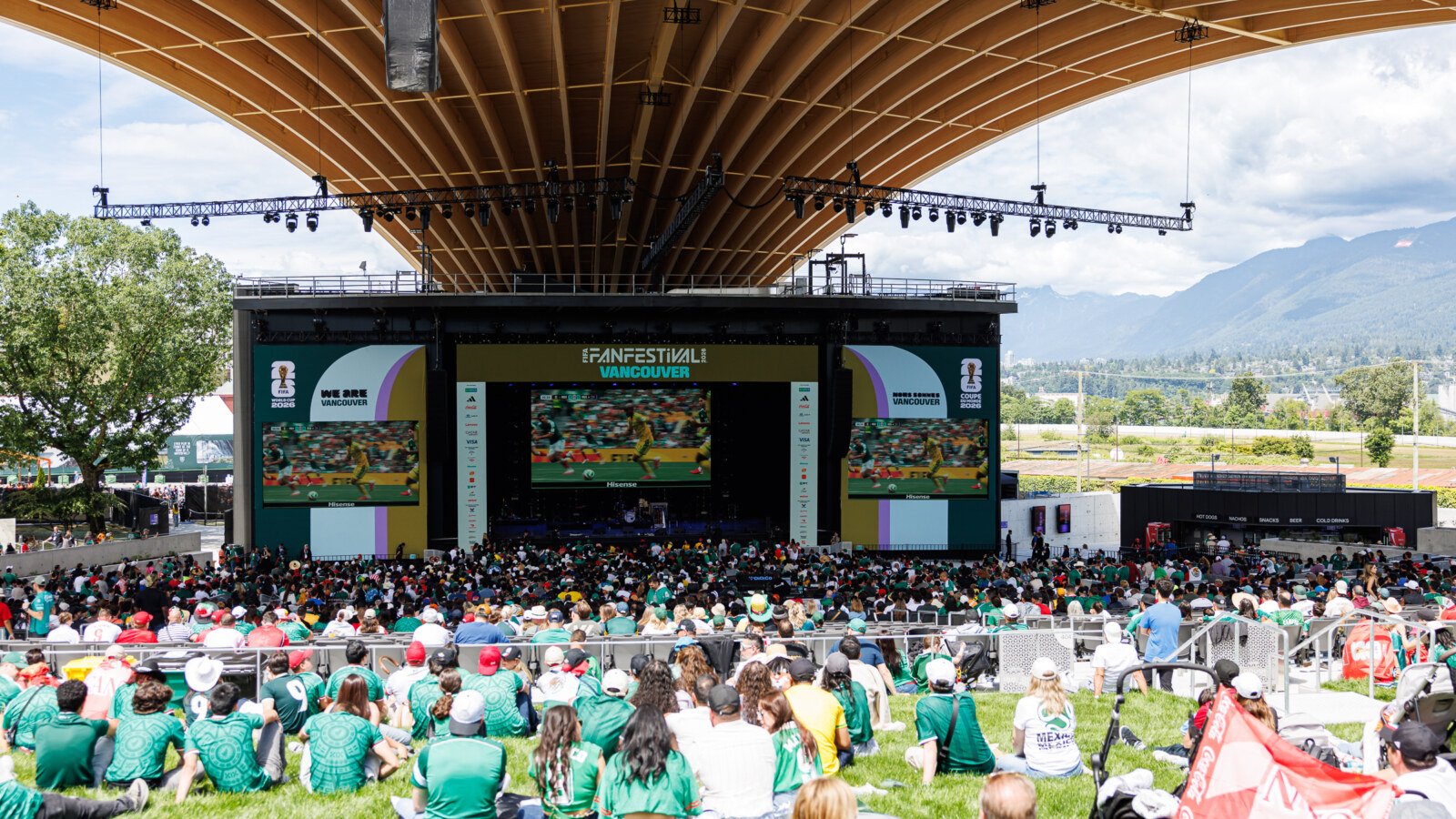 Group of Mexican fans posing together at FIFA Fan Festival Vancouver