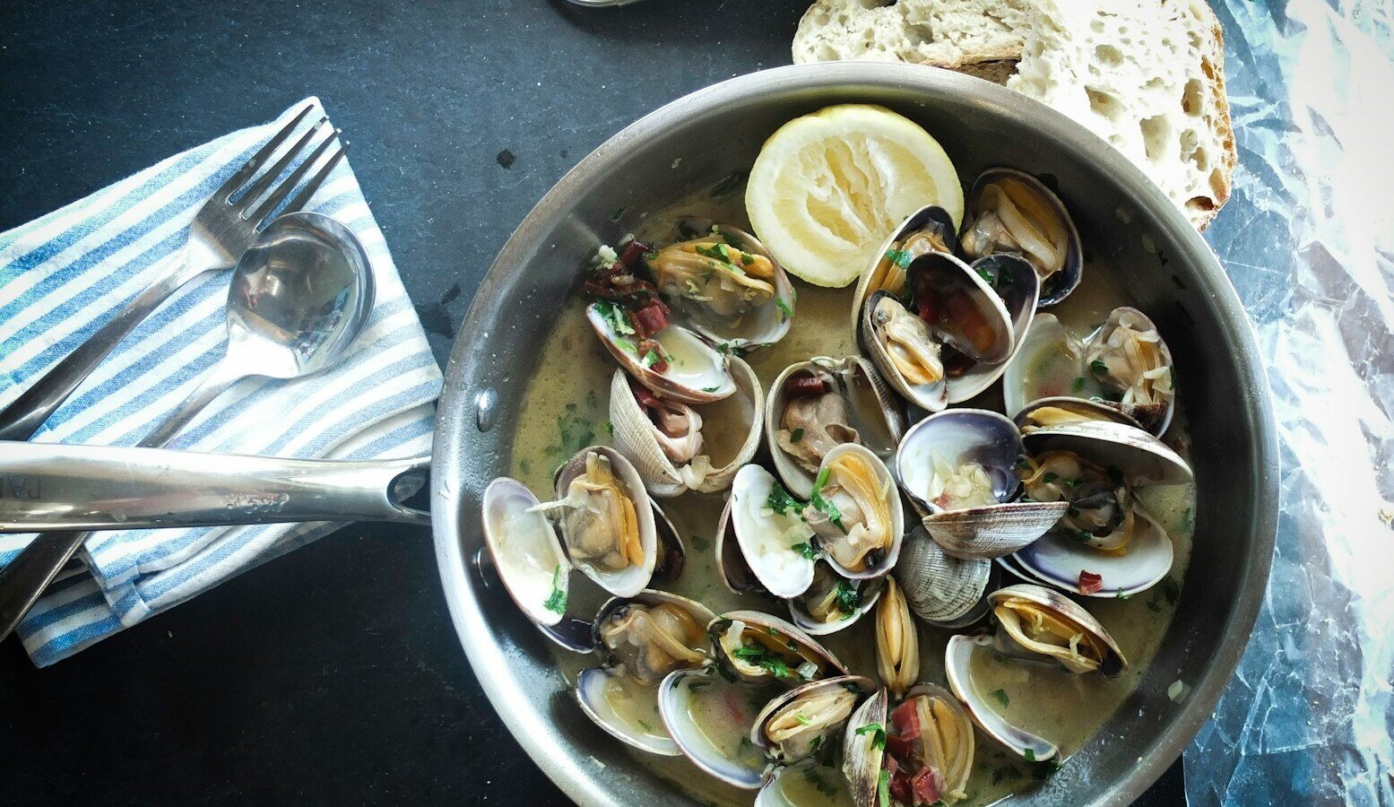 round silver steel bowl with scallops