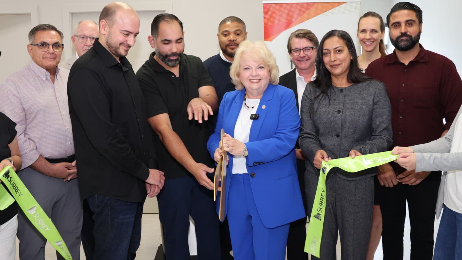 Officials, physicians and community partners participate in a ribbon-cutting ceremony for Surrey's first City-supported medical clinic in Surrey City Centre