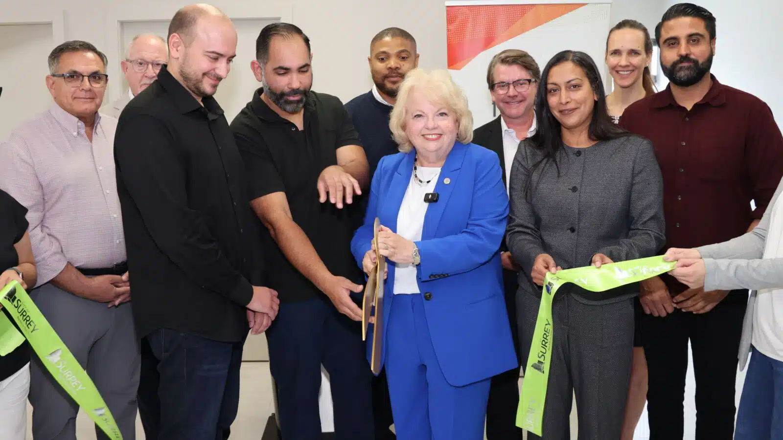 Officials, physicians and community partners participate in a ribbon-cutting ceremony for Surrey's first City-supported medical clinic in Surrey City Centre