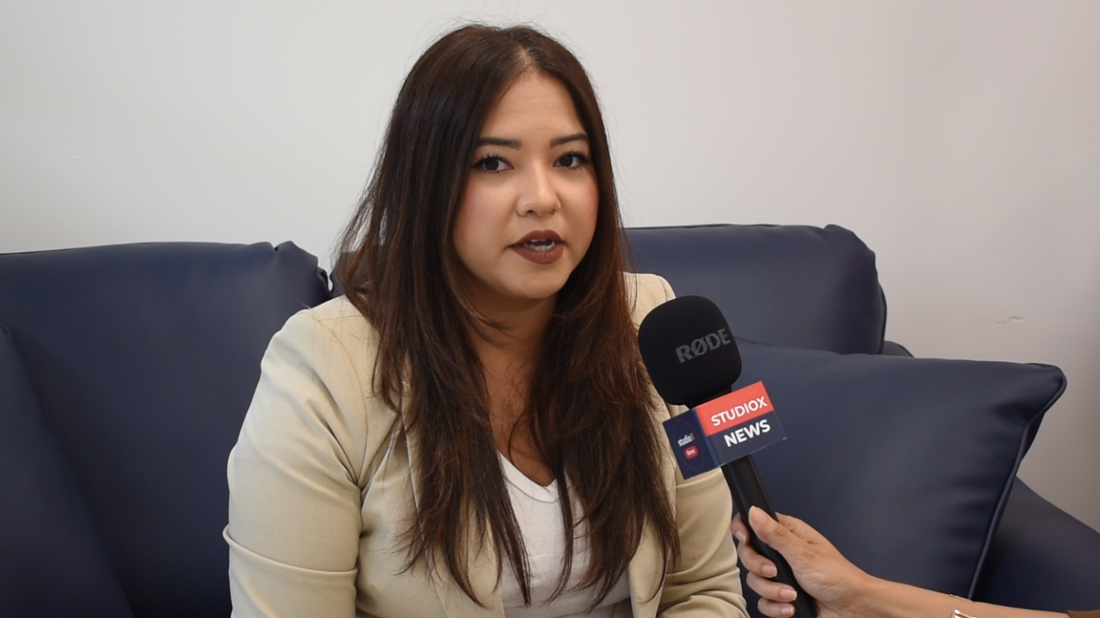 MLA Amna Shah speaking with Surrey residents about racism, health care, pricing and transit