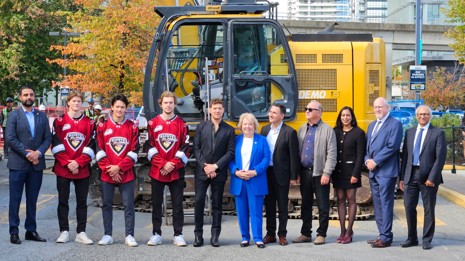 Group at Surrey City Centre Arena demolition: Councillor Harry Bains, Giants players Kaleb Hartmann, Cash Koch and Jakob Oreskovic, Michael Bublé, Mayor Brenda Locke, City Manager Rob Costanzo, Ron Toigo, Councillor Pardeep Kooner, Councillor Rob Stutt and Bill Aujla