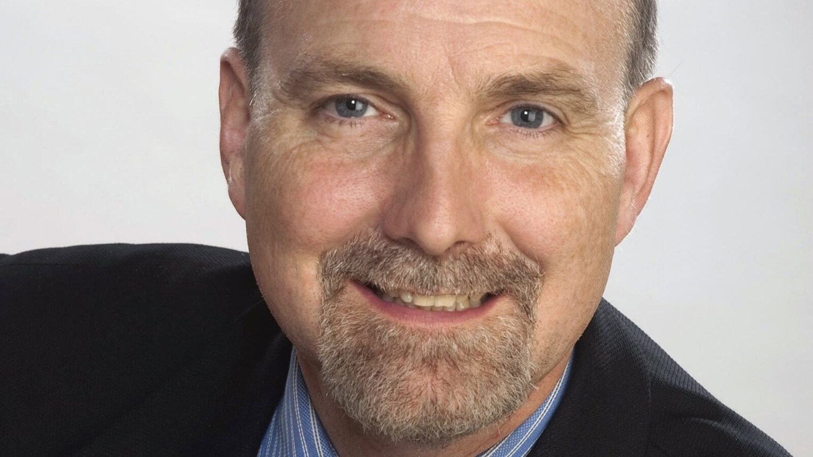 StudioX News graphic showing Craig Hodge leading the 2026 Coquitlam mayoral election with 15,654 votes (60.54%), according to unofficial results.